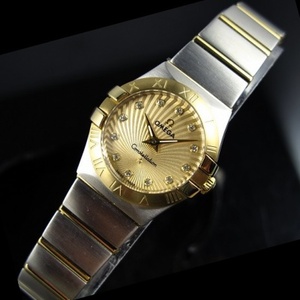 Suizo Omega OMEGA Constellation cuarzo doble águila 18K oro ultradelgada reloj de mujer sol patrón oro cara diamond Index Damas reloj 123.20.24.60